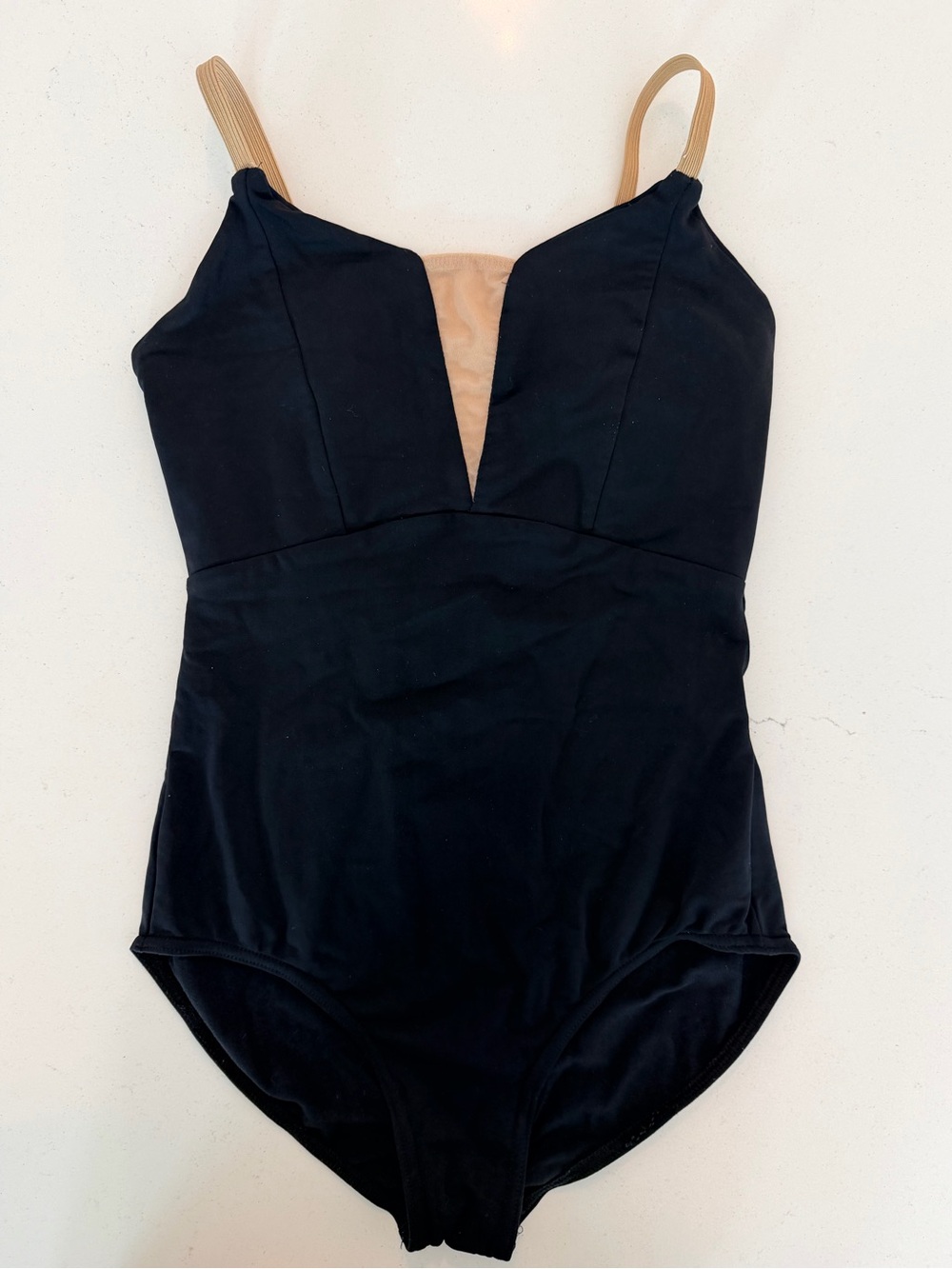 Womenโs Black Bodysuit with Nude Straps and V-Plunge